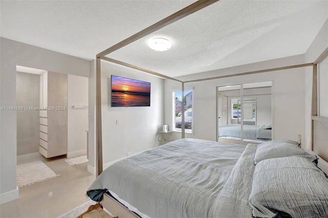 bedroom featuring a textured ceiling