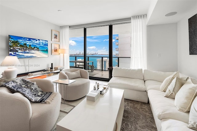 living room with floor to ceiling windows