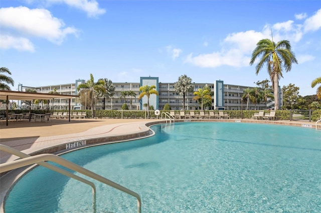 view of swimming pool featuring a patio