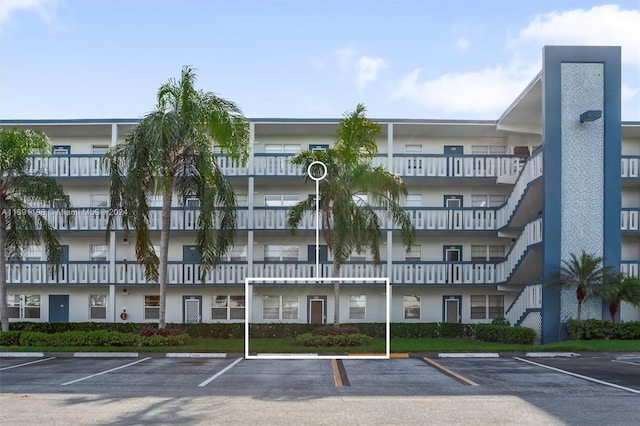 1042 Lincoln C Unit 1042, Boca Raton, FL 33434 - view of apartment building / complex featuring uncovered parking