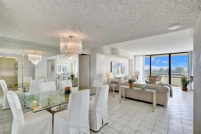 dining area featuring expansive windows, a textured ceiling, and light tile patterned floors