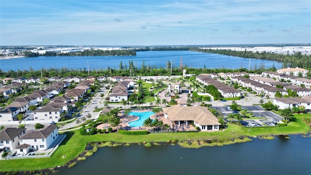 bird's eye view with a water view