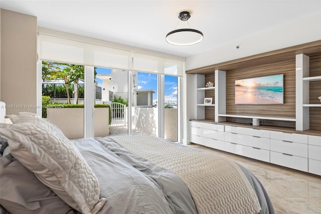 bedroom featuring access to outside and multiple windows