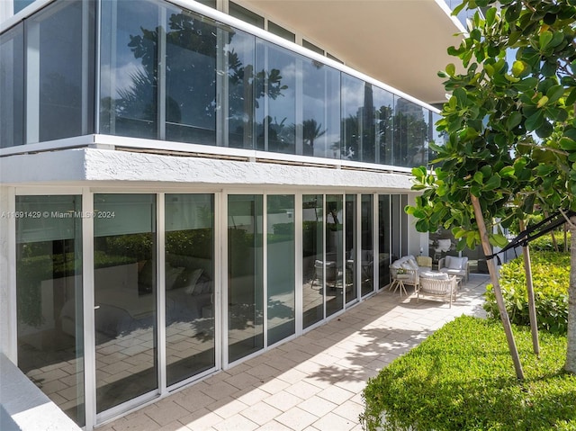 view of property exterior featuring a patio