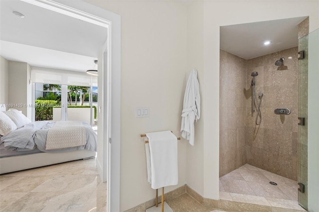 bathroom featuring a shower with door