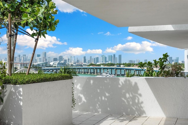 view of pool featuring a water view