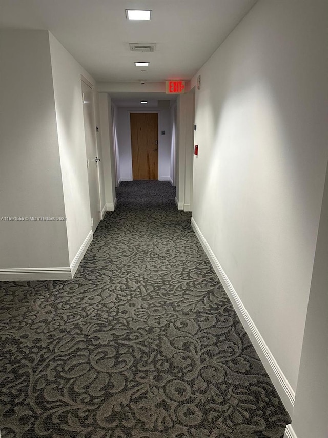 hallway with carpet