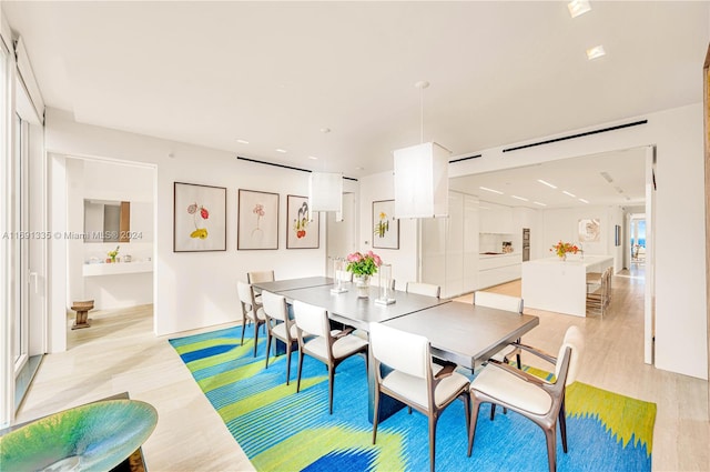 dining area featuring light hardwood / wood-style floors