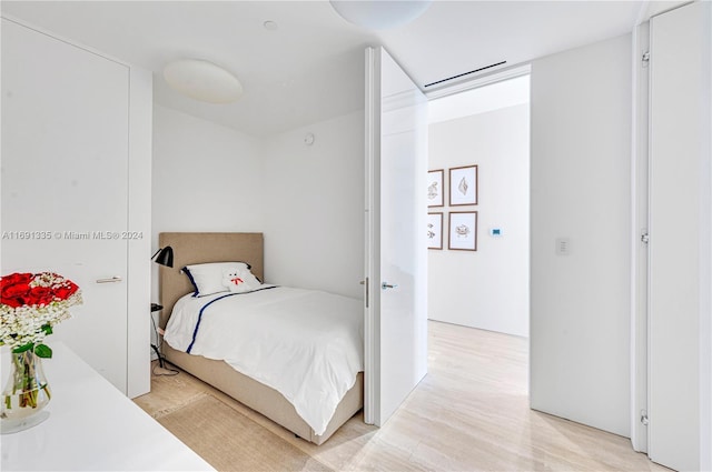 9111 Collins Ave Unit N-Ph6, Surfside, FL 33154 - bedroom with light wood-style flooring