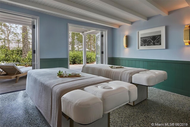 9111 Collins Ave Unit N-Ph6, Surfside, FL 33154 - bedroom featuring multiple windows, wainscoting, access to outside, and beam ceiling