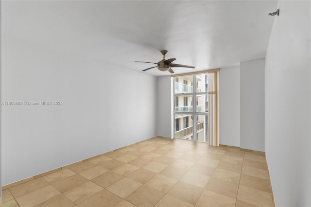 spare room featuring ceiling fan