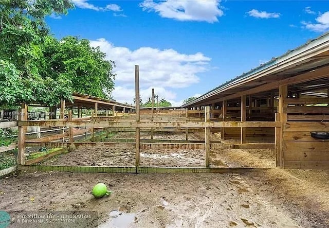 11090 SW 28th Ct, Davie, FL 33328 - view of yard featuring an exterior structure and an outbuilding