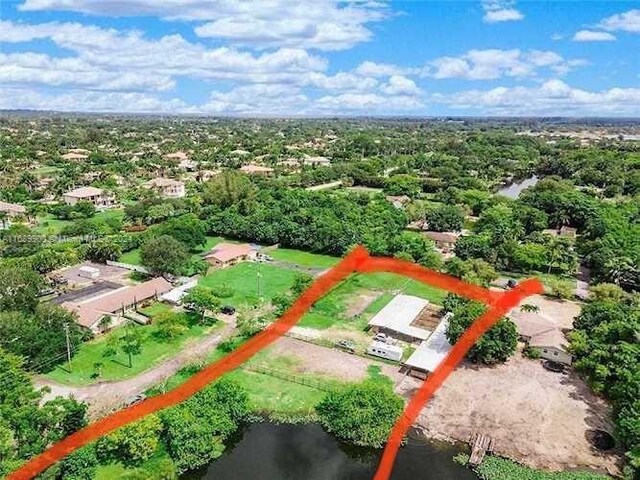 11090 SW 28th Ct, Davie, FL 33328 - aerial view of property's location featuring property parcel outlined and a nearby body of water