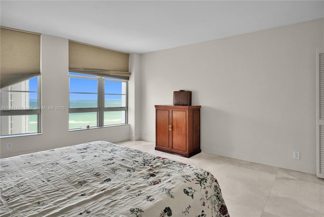 bedroom with a water view