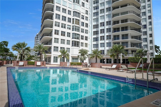 view of swimming pool featuring a patio