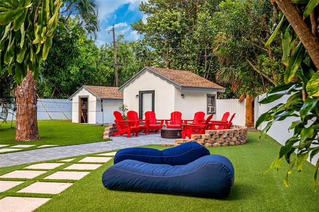 1899 NE 49th Ct, Pompano Beach, FL 33064 - view of yard with a fire pit and a patio area