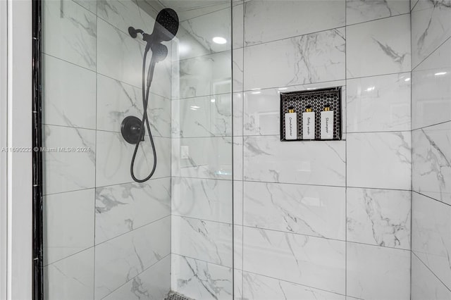 1899 NE 49th Ct, Pompano Beach, FL 33064 - bathroom featuring a tile shower
