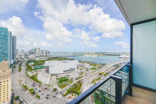 balcony featuring a water view