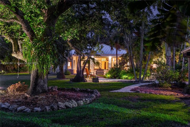 13470 SW 67th Ave, Pinecrest, FL 33156 - view of property hidden behind natural elements with a front yard