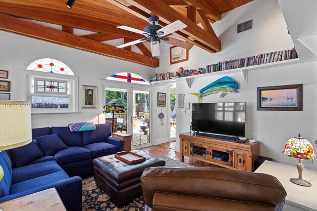 13470 SW 67th Ave, Pinecrest, FL 33156 - living room with beamed ceiling, ceiling fan, high vaulted ceiling, and tile patterned flooring