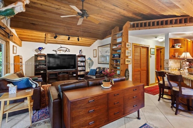 tiled living room with lofted ceiling with beams, ceiling fan, wooden ceiling, and track lighting