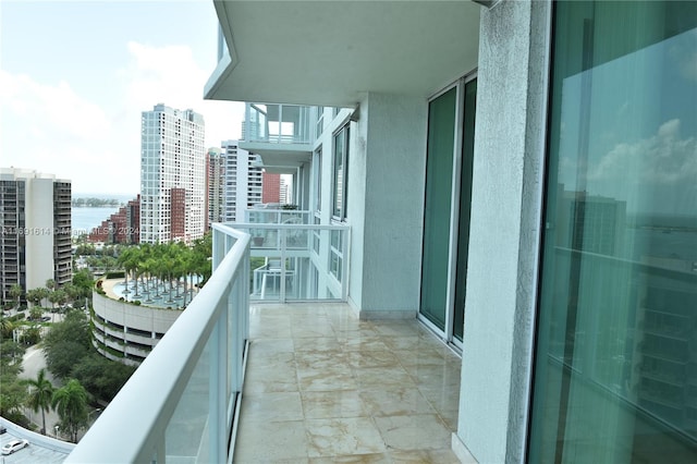 balcony featuring a water view