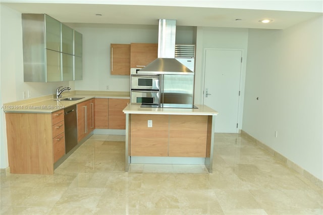 kitchen featuring exhaust hood, sink, appliances with stainless steel finishes, and a center island