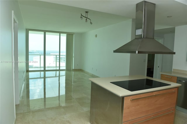 kitchen featuring black electric cooktop, a water view, a kitchen island, island exhaust hood, and dishwasher