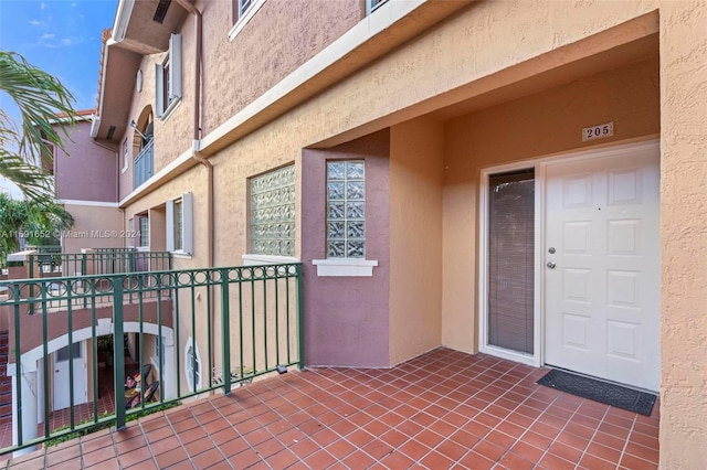 doorway to property with a balcony