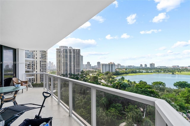 balcony featuring a water view