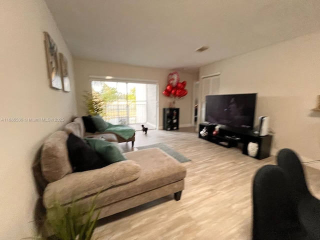 living room featuring light wood-type flooring