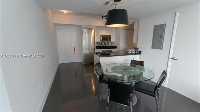 dining area featuring electric panel