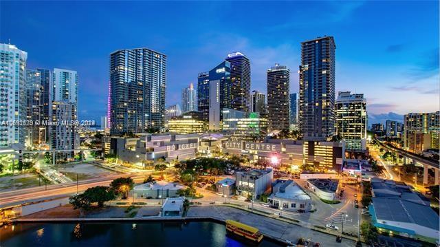 property's view of city with a water view