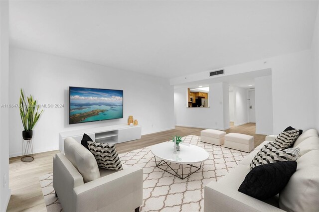 living room with hardwood / wood-style floors