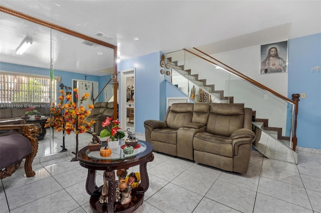 living room with light tile patterned flooring