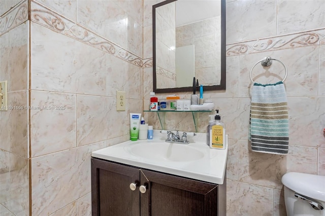 bathroom with toilet and vanity