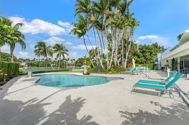 view of swimming pool featuring a patio