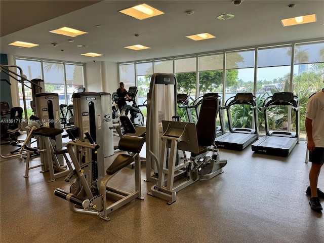 workout area with floor to ceiling windows