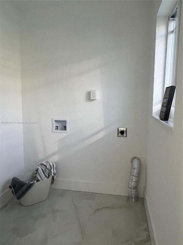 laundry room with hookup for a washing machine, electric dryer hookup, and a healthy amount of sunlight