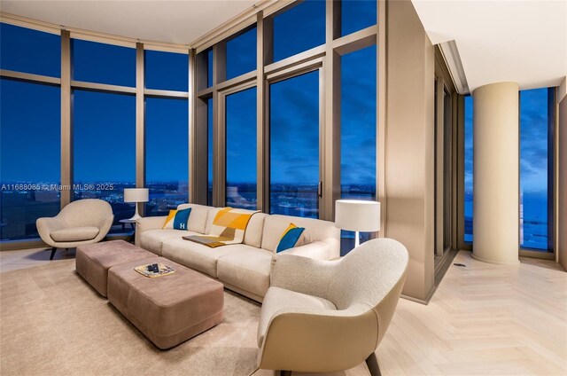 living room with parquet floors and expansive windows