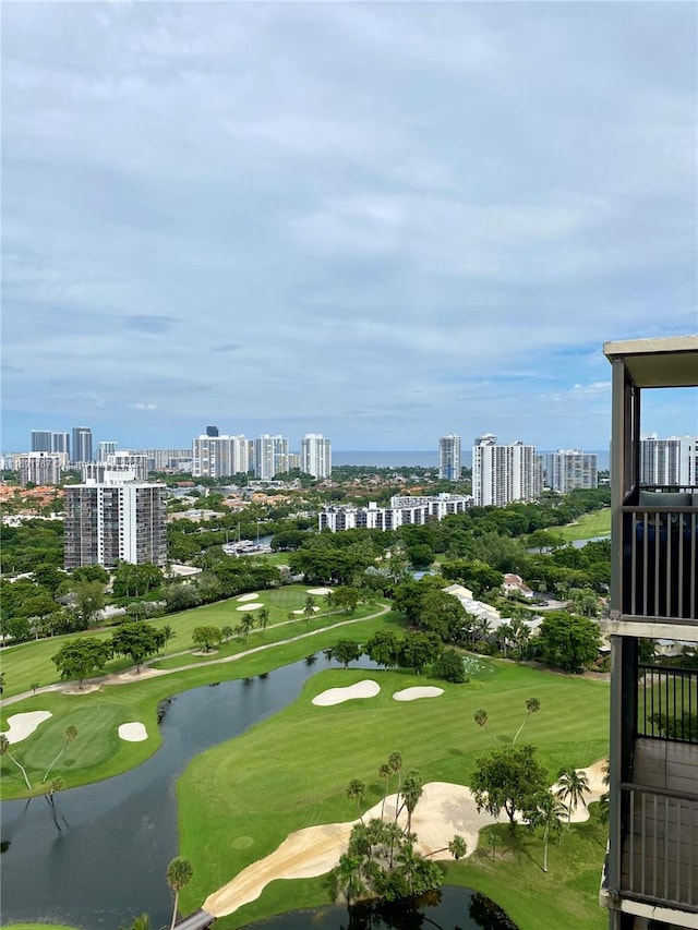 surrounding community with a water view