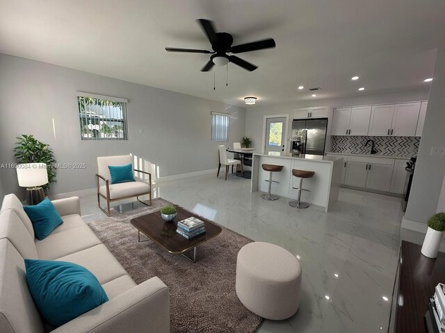 living room featuring ceiling fan