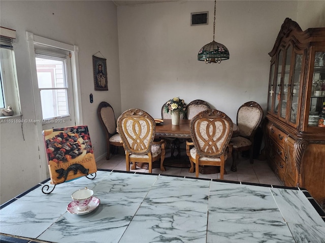 view of tiled dining space