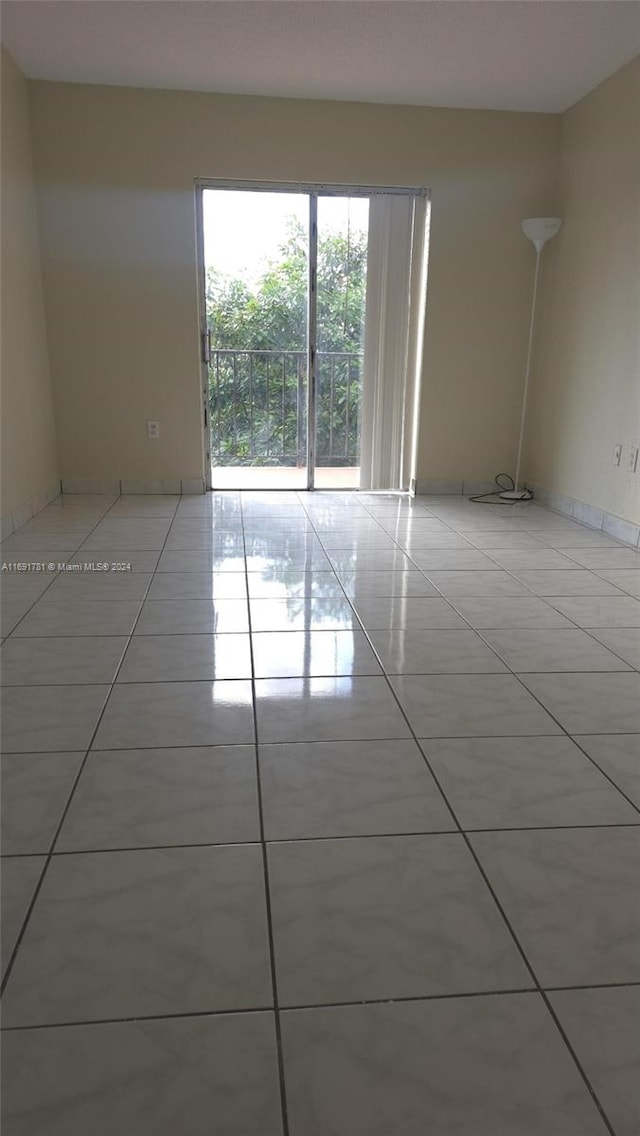 view of tiled spare room