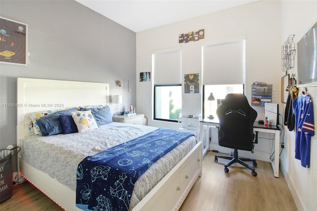 bedroom featuring wood-type flooring