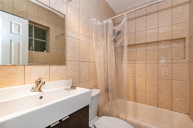 full bathroom with shower / bath combo, toilet, tile walls, tasteful backsplash, and vanity