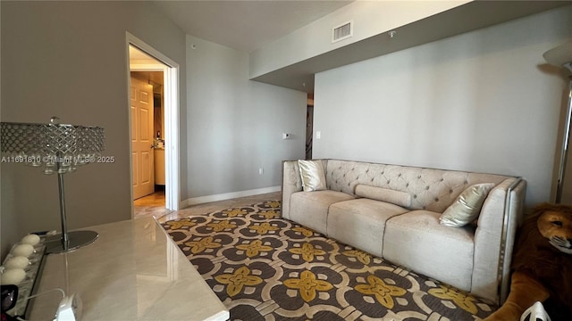 living room featuring a baseboard heating unit