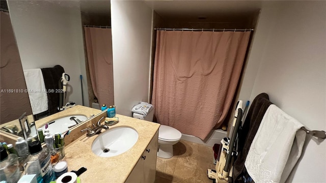 full bathroom with vanity, shower / bath combination with curtain, and toilet