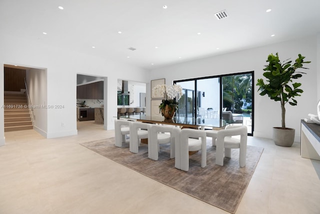 11150 Griffing Blvd, Biscayne Park, FL 33161 - dining space with stairway and recessed lighting