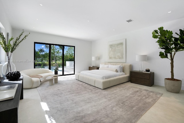 11150 Griffing Blvd, Biscayne Park, FL 33161 - bedroom with access to exterior, finished concrete flooring, and recessed lighting